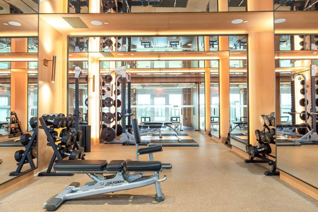 515 West 18th Street, Unit 308 Manhattan, NY 10011 - Photo 9 of 16 a view of a room with gym equipment