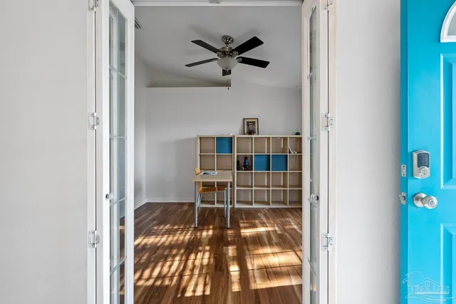 a view of an empty room with a window
