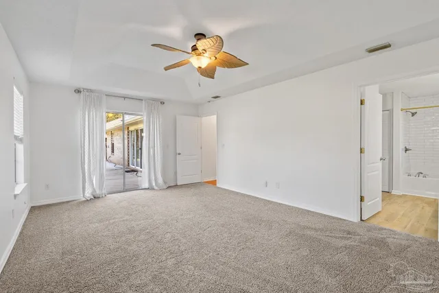 a bathroom with a sink a mirror and a shower