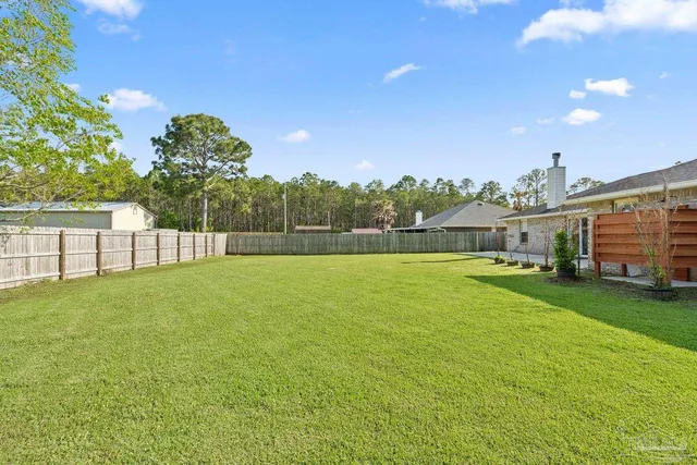 a view of outdoor space and yard