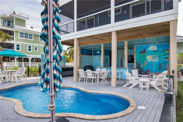 a view of a house with swimming pool