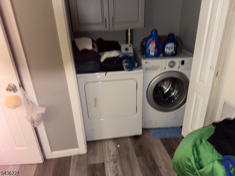 218 Bell Avenue Lodi, NJ 07644 - Photo 11 of 14 a utility room with dryer and washer