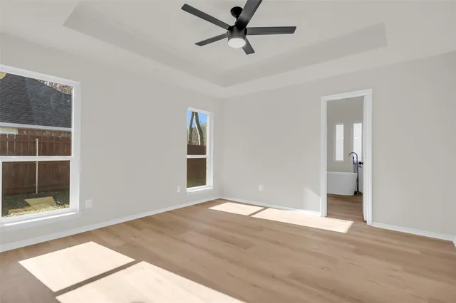 a bathroom with a double vanity sink mirror and shower