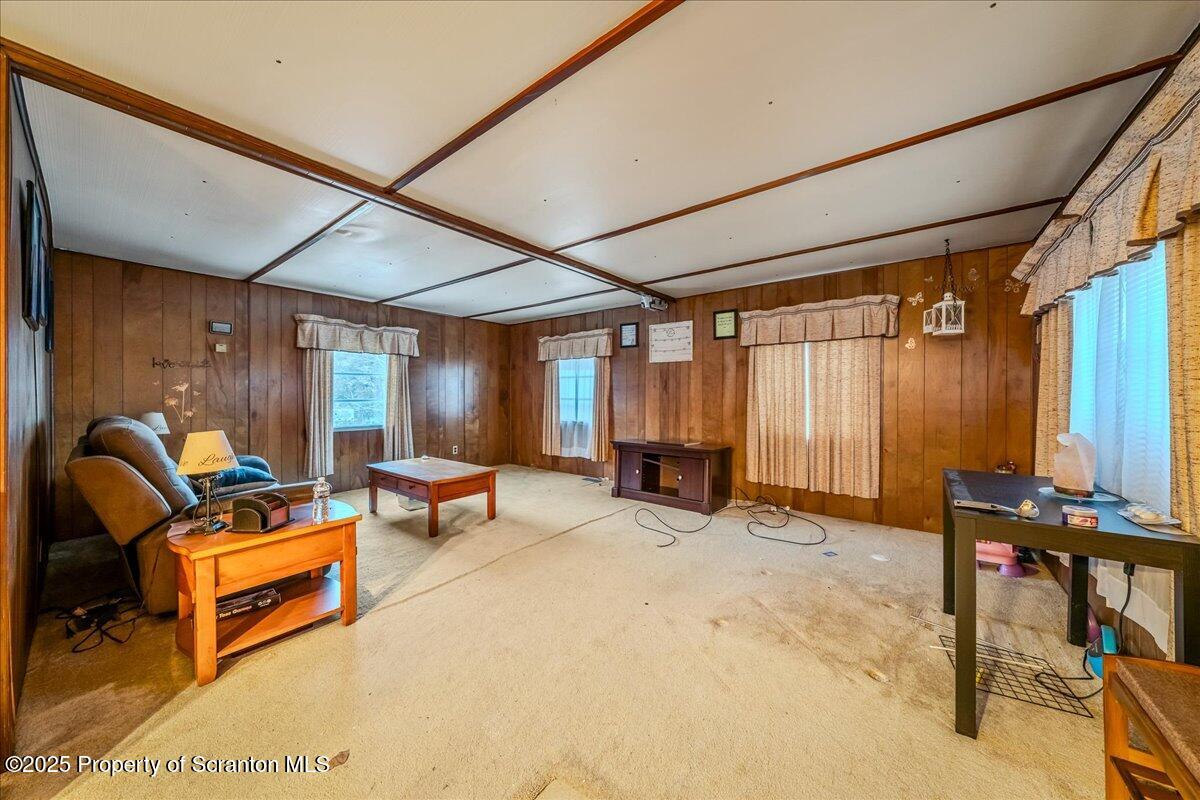 2099 Turnpike Road Dalton, PA 18414 - Photo 2 of 16 a bedroom with furniture and a window
