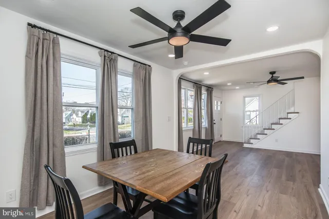 a kitchen with stainless steel appliances granite countertop a stove and a refrigerator