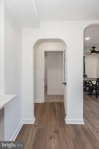 a view of staircase with wooden floor and stairs