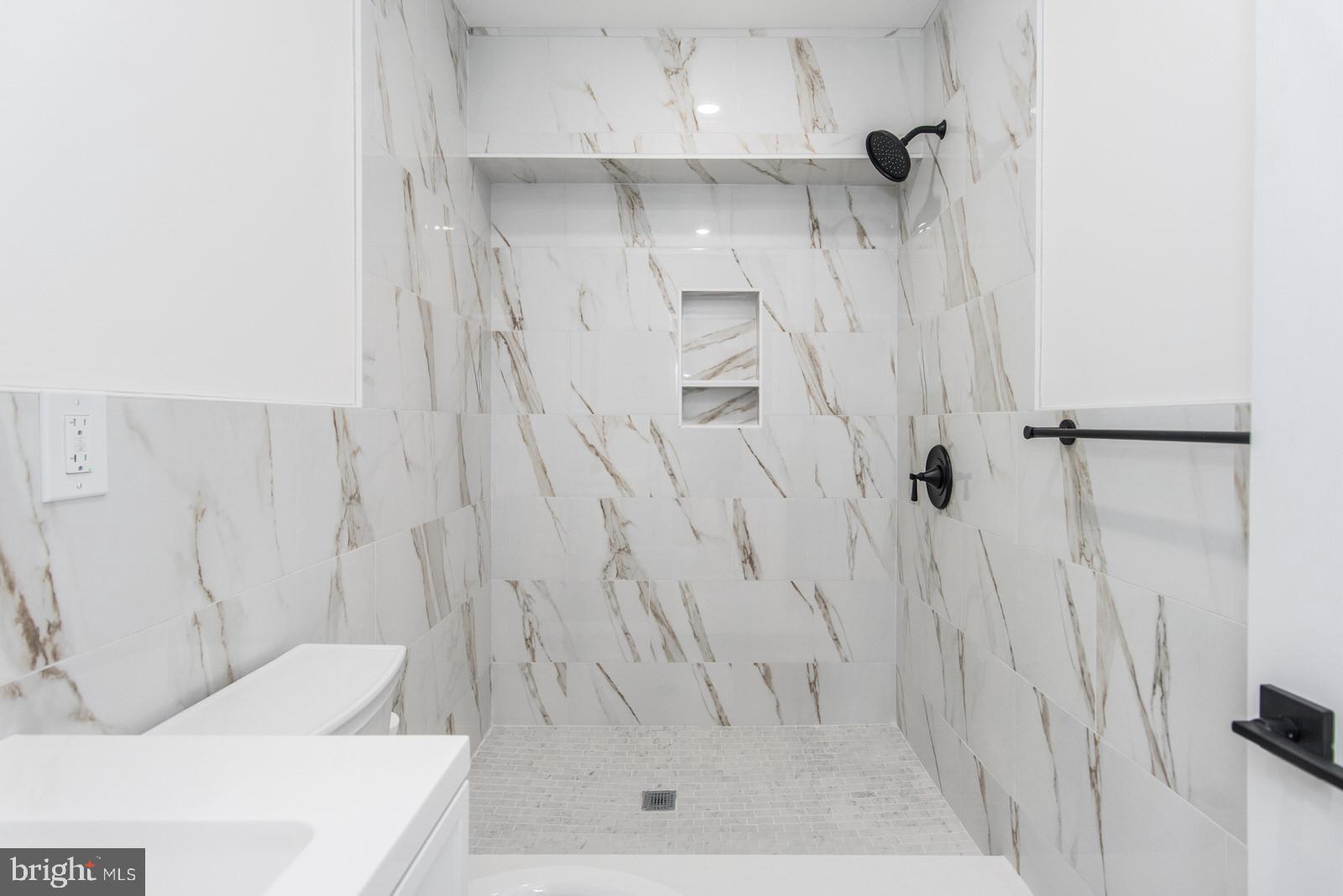 17 Rhode Island Avenue Cherry Hill, NJ 08002 - Photo 36 of 86 a bathroom with a bathtub and a shower