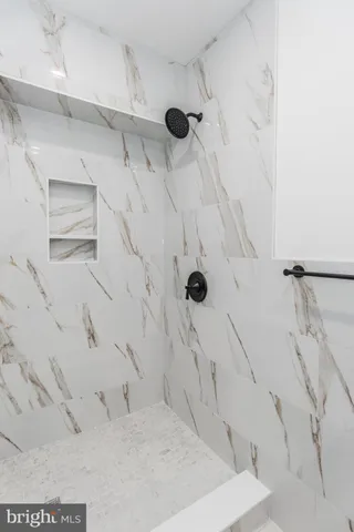 a view of hallway with wooden floor