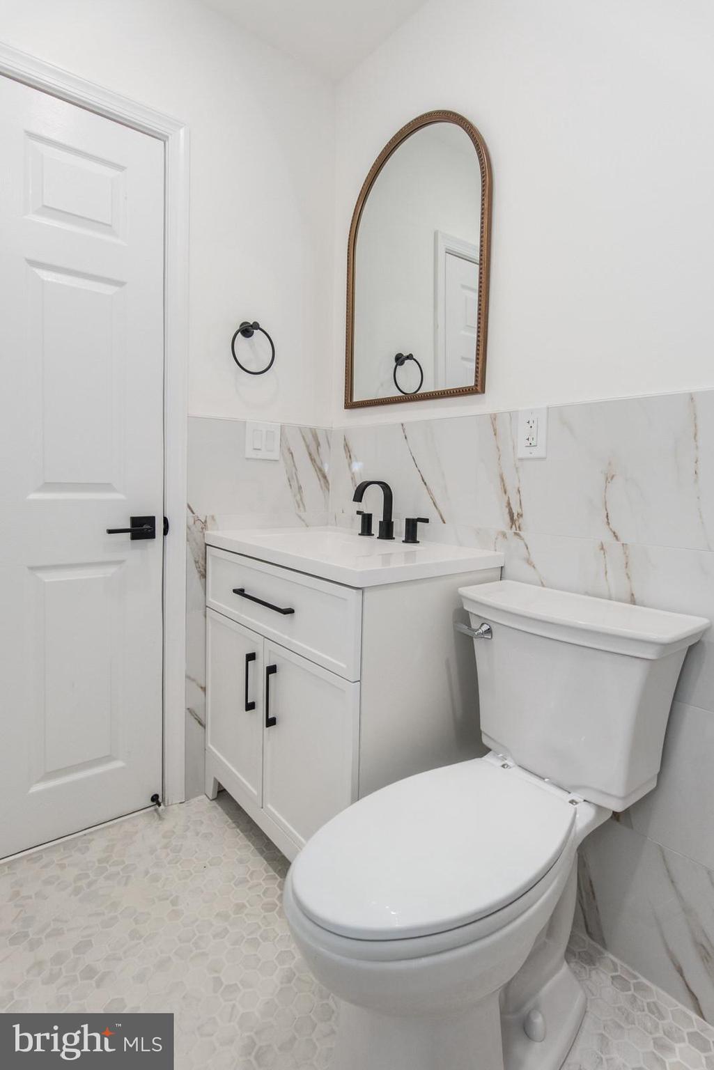 17 Rhode Island Avenue Cherry Hill, NJ 08002 - Photo 38 of 86 a bathroom with a toilet a sink and mirror