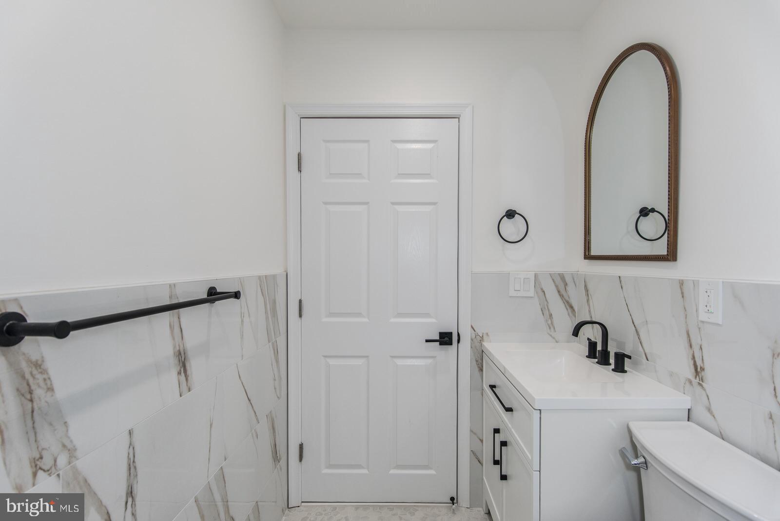 17 Rhode Island Avenue Cherry Hill, NJ 08002 - Photo 40 of 86 a bathroom with a sink and a mirror