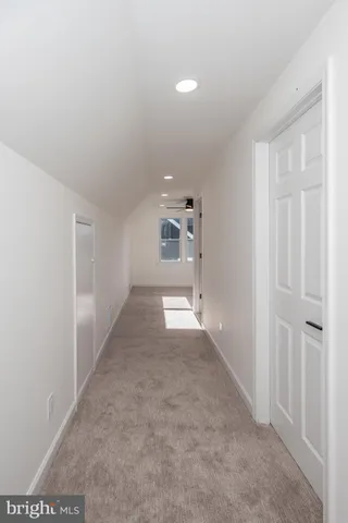 a view of a dining room with furniture and window