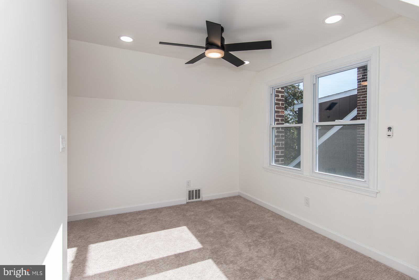 17 Rhode Island Avenue Cherry Hill, NJ 08002 - Photo 47 of 86 an empty room with windows and fan