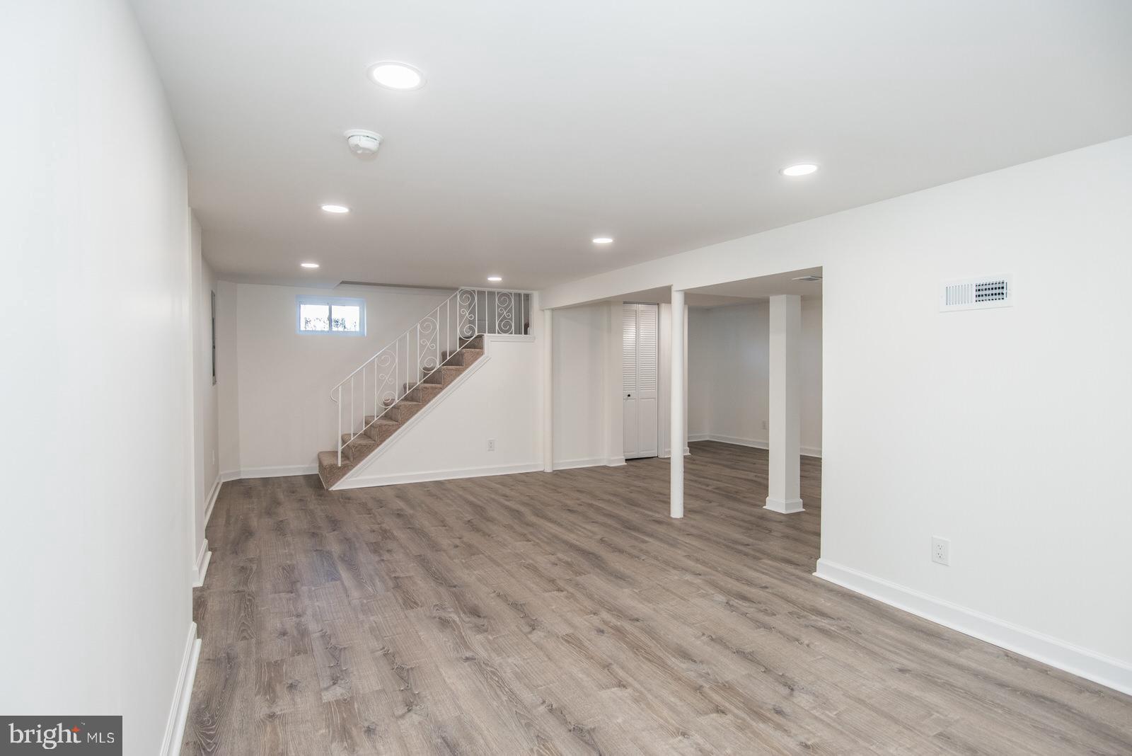 17 Rhode Island Avenue Cherry Hill, NJ 08002 - Photo 64 of 86 a view of an empty room with wooden floor