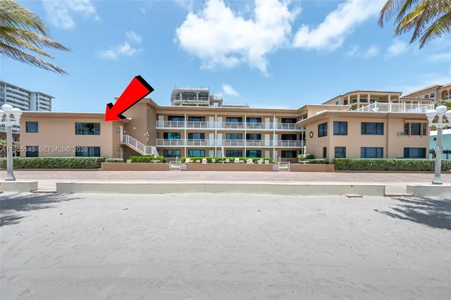 a front view of building with road