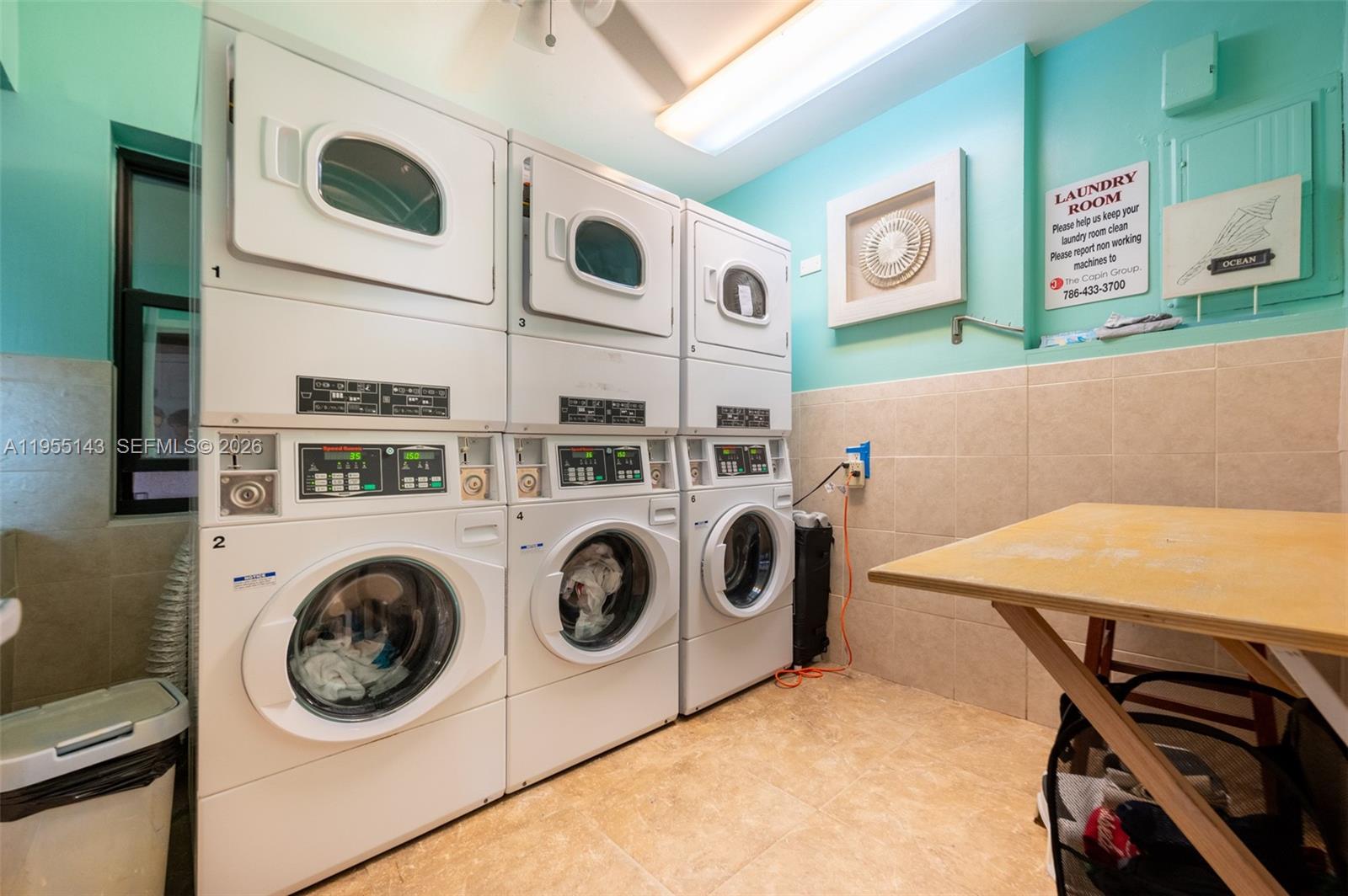 3300 North Surf Road, Unit 17A Hollywood, FL 33019 - Photo 24 of 24 a utility room with dryer and washer