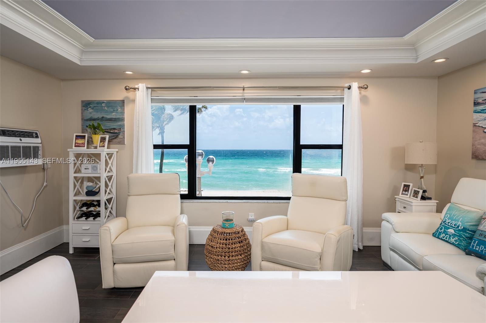 3300 North Surf Road, Unit 17A Hollywood, FL 33019 - Photo 5 of 24 a living room with furniture and a large window