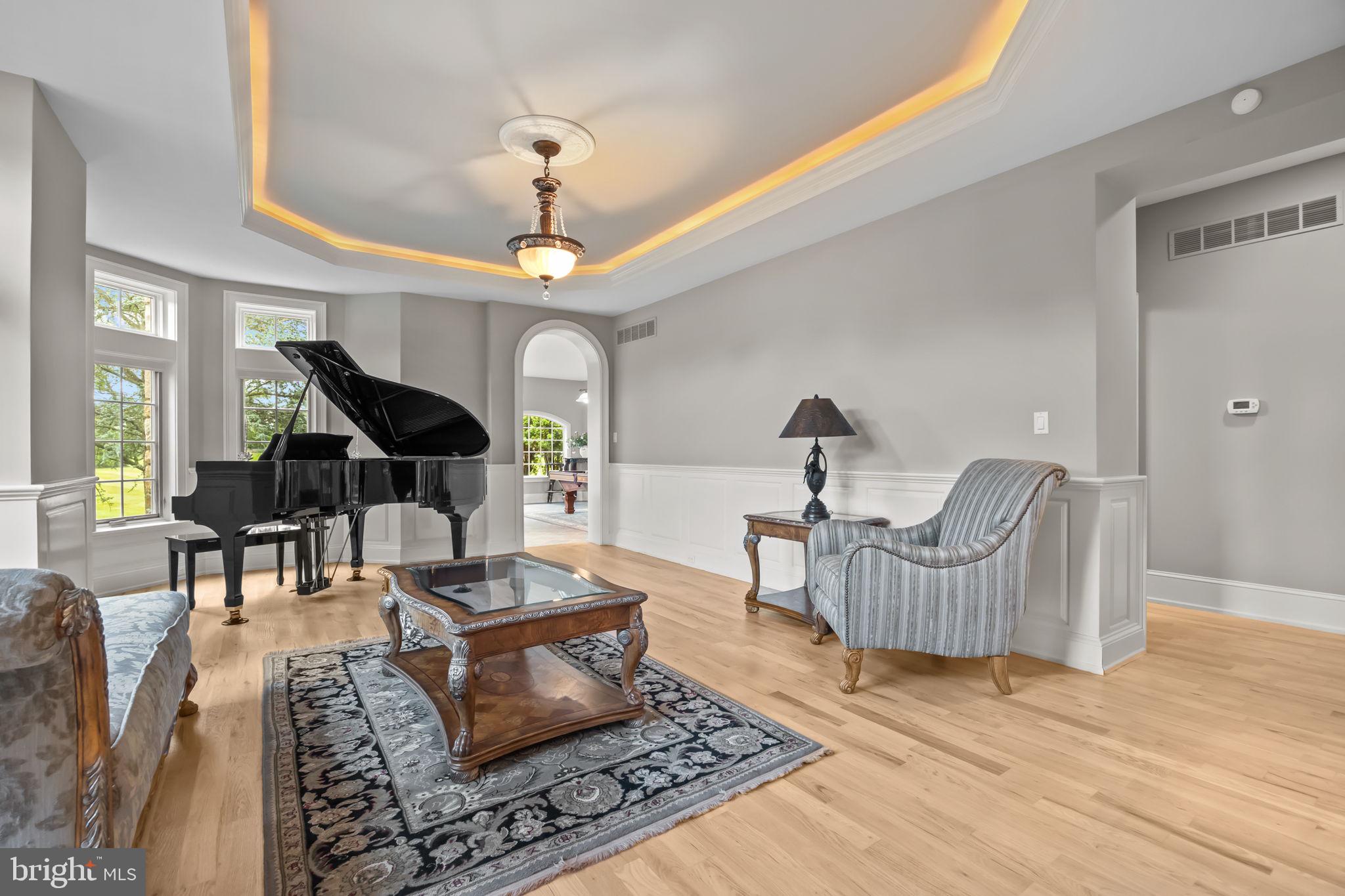 2 Aldans Way Newtown, PA 18940 - Photo 11 of 100 a living room with furniture and a chandelier
