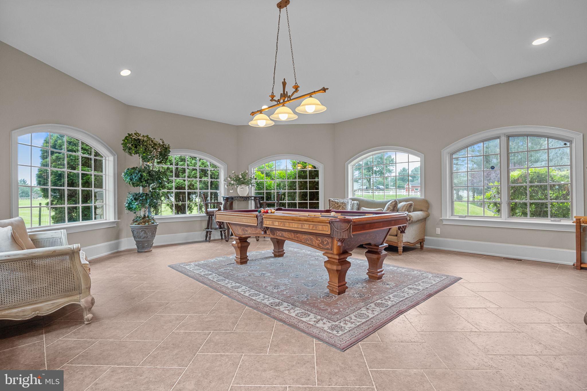 2 Aldans Way Newtown, PA 18940 - Photo 13 of 100 a living room with furniture a window and a chandelier