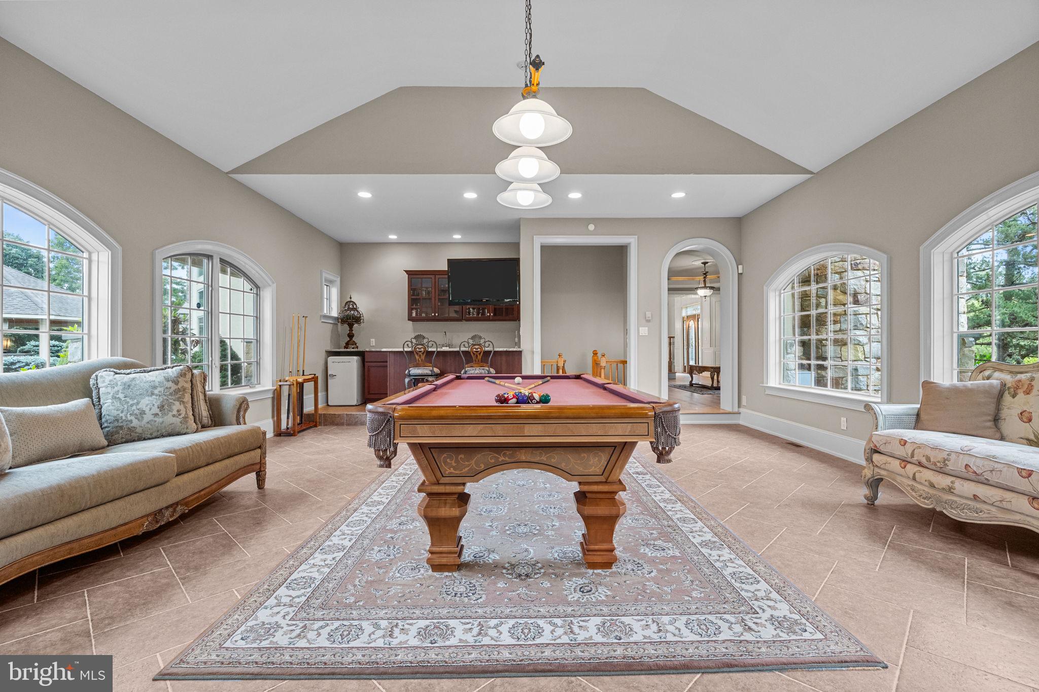 2 Aldans Way Newtown, PA 18940 - Photo 14 of 100 a living room with furniture a rug and a chandelier