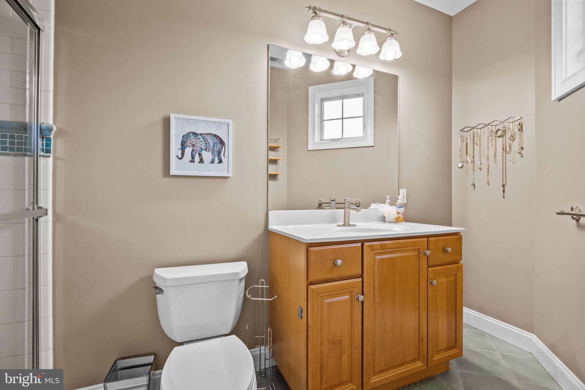 2 Aldans Way Newtown, PA 18940 - Photo 38 of 100 a bathroom with a toilet a sink and a mirror