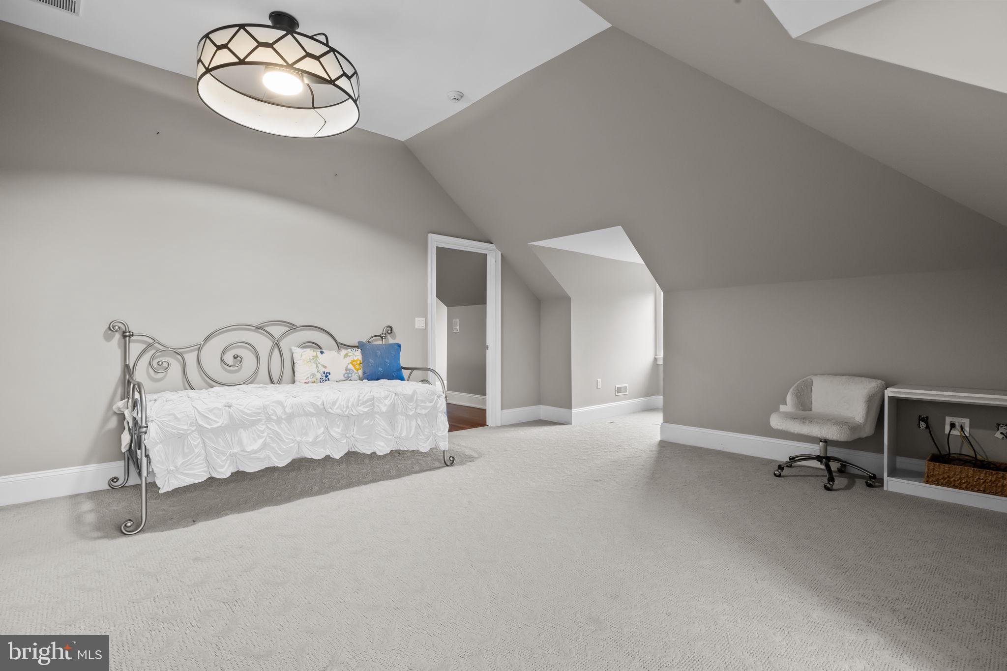 2 Aldans Way Newtown, PA 18940 - Photo 62 of 100 a spacious bedroom with a bed and a chair