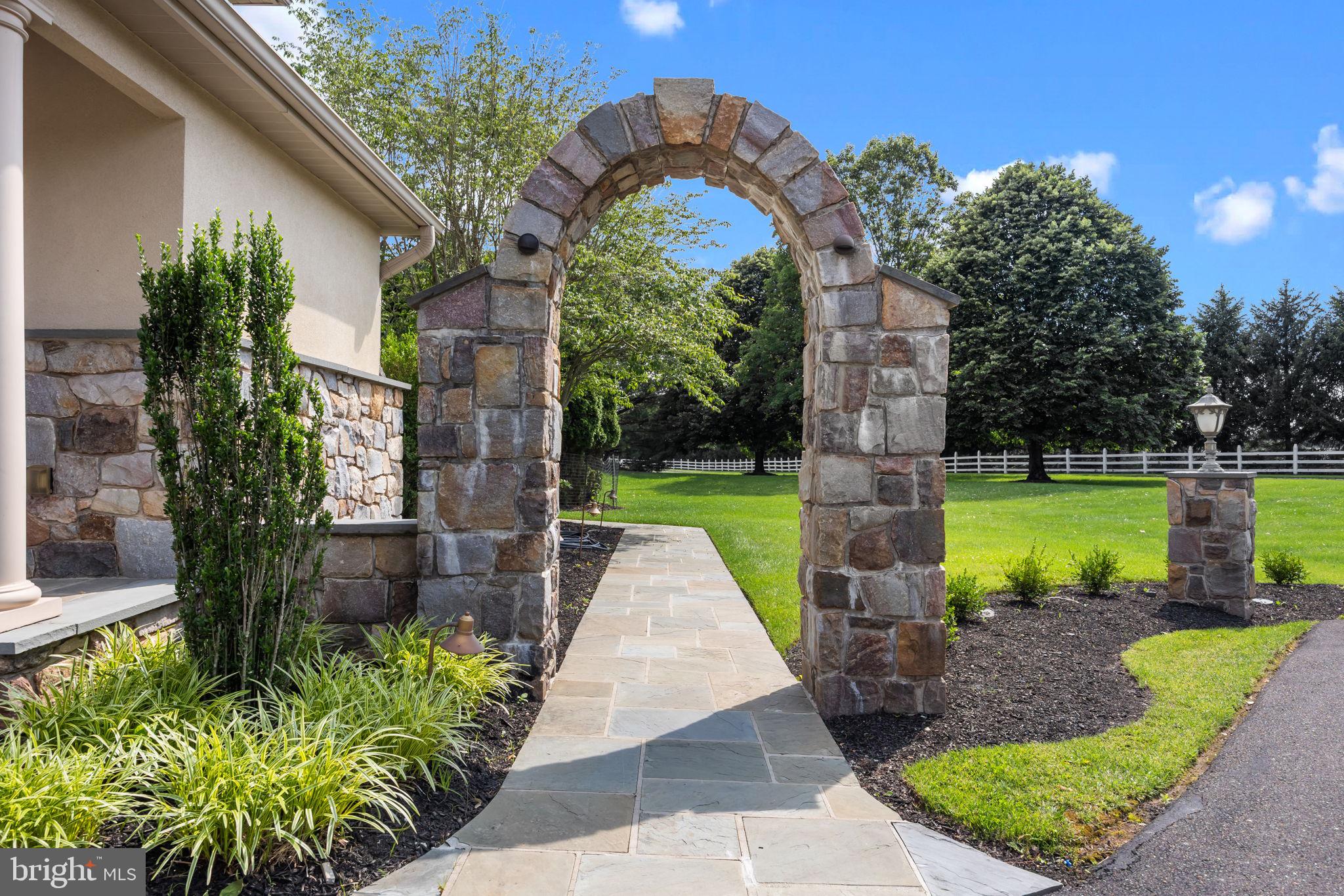 2 Aldans Way Newtown, PA 18940 - Photo 7 of 100 a front view of a house with garden