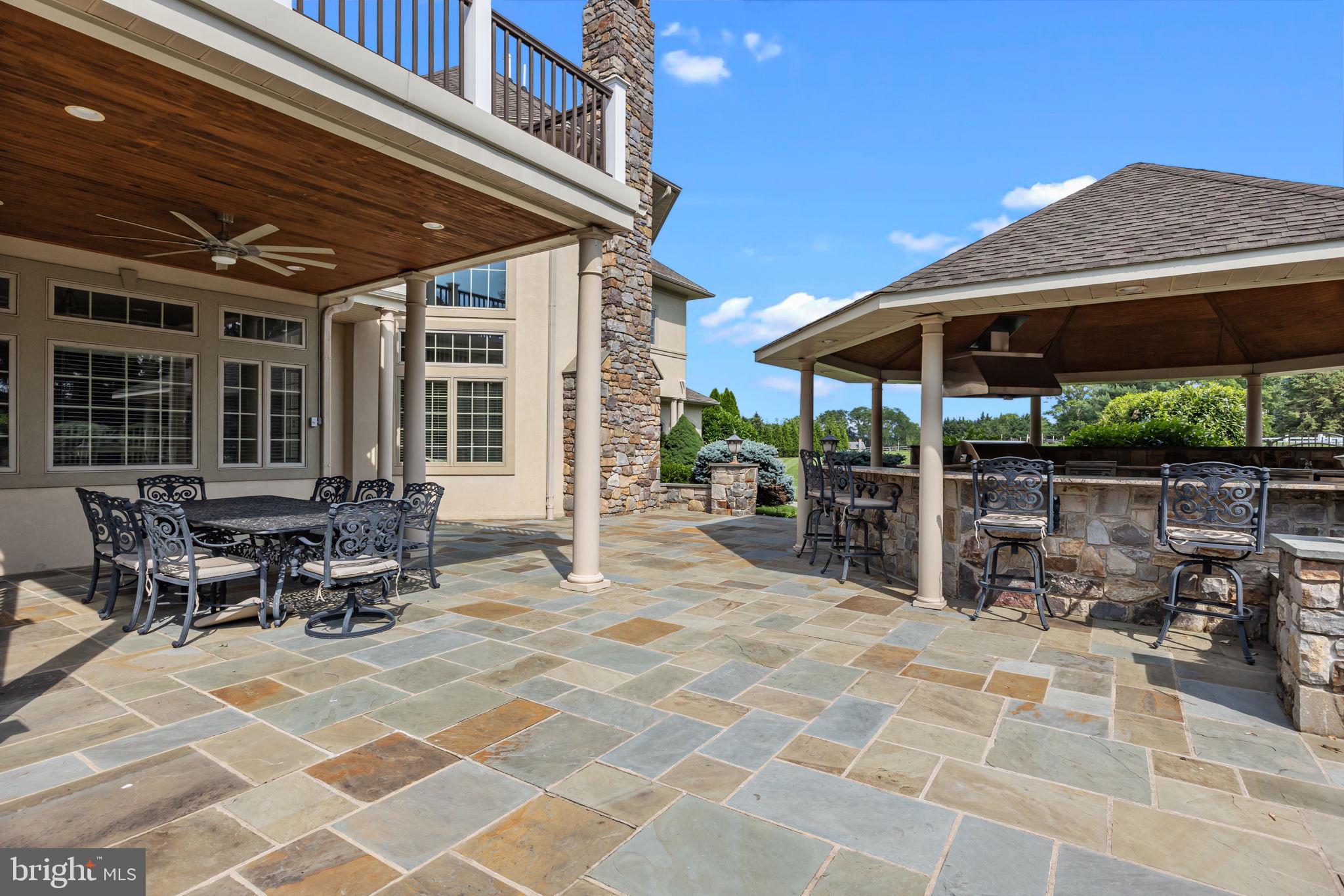 2 Aldans Way Newtown, PA 18940 - Photo 78 of 100 a patio with tables and chairs