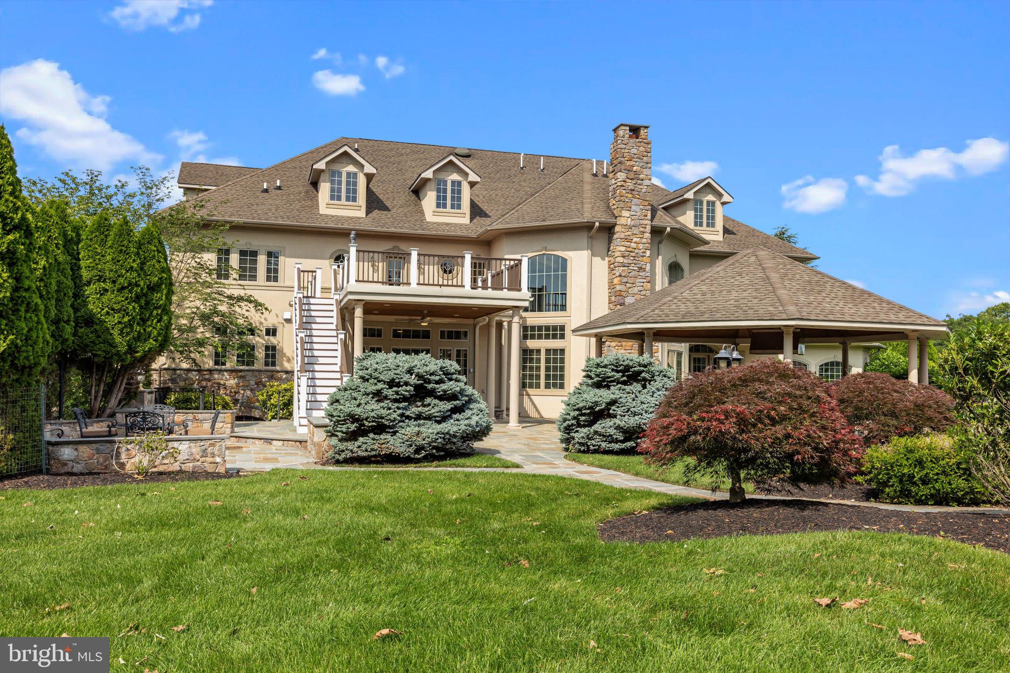 2 Aldans Way Newtown, PA 18940 - Photo 92 of 100 a front view of a house with a garden