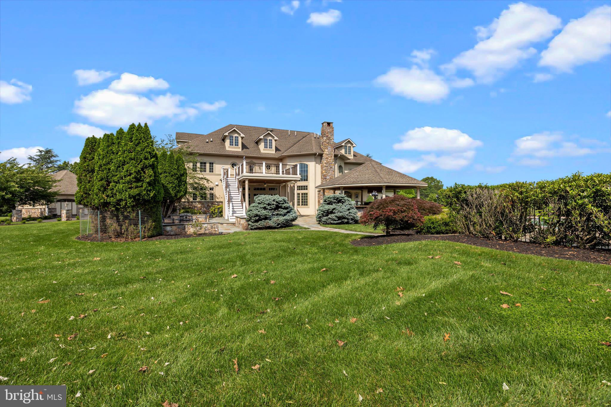 2 Aldans Way Newtown, PA 18940 - Photo 93 of 100 a front view of a house with garden