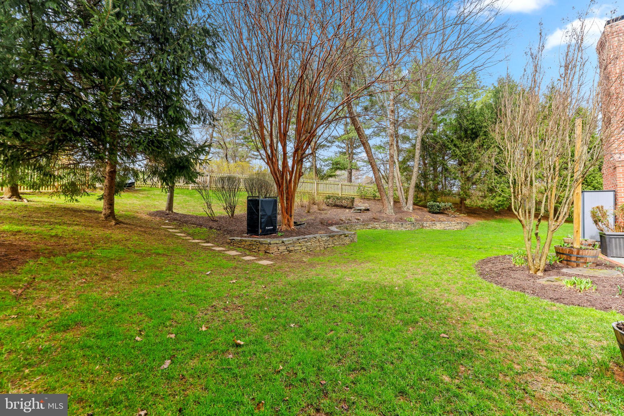6513 Apple Blossom Ride Columbia, MD 21044 - Photo 106 of 115 a view of a backyard with green space