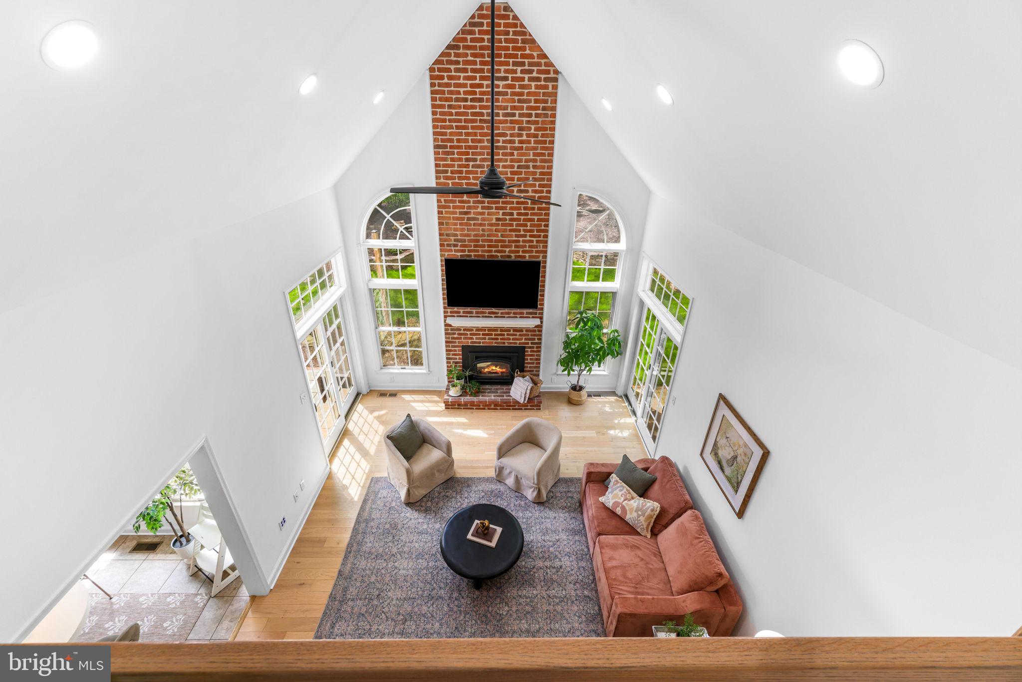 6513 Apple Blossom Ride Columbia, MD 21044 - Photo 19 of 115 a view of living room with furniture and a fireplace
