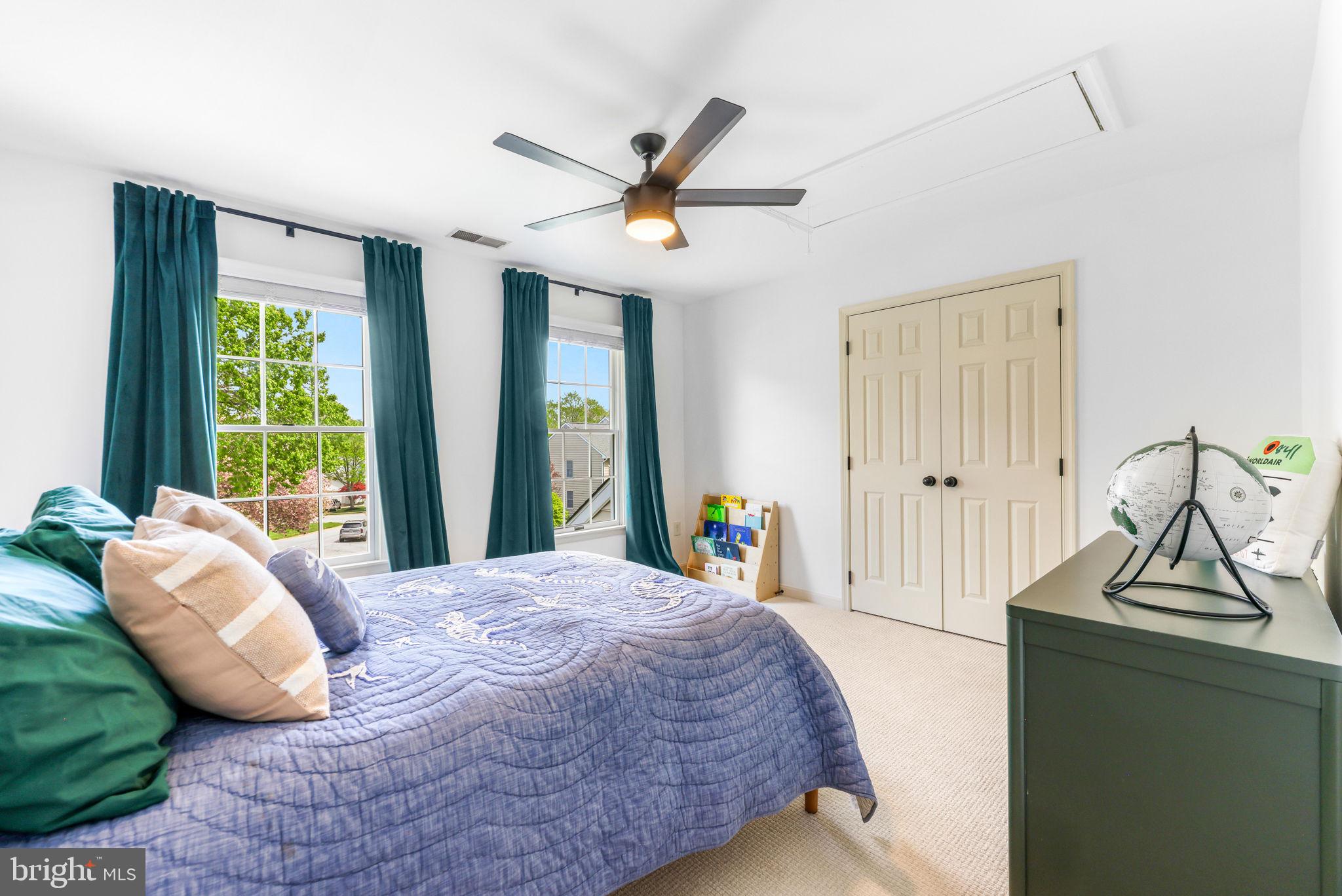 6513 Apple Blossom Ride Columbia, MD 21044 - Photo 55 of 115 a bedroom with a bed and window