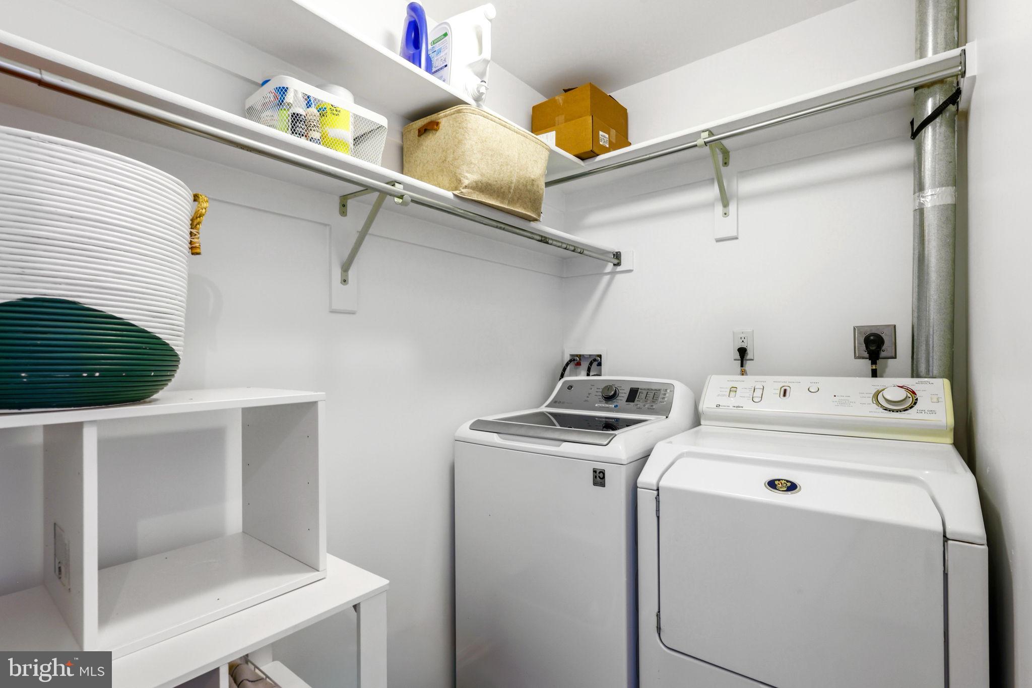 6513 Apple Blossom Ride Columbia, MD 21044 - Photo 61 of 115 a utility room with dryer and washer