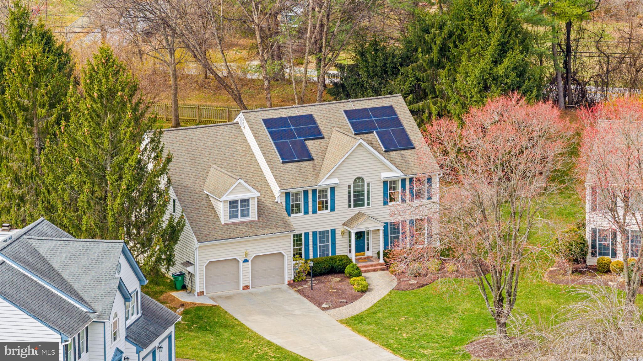 6513 Apple Blossom Ride Columbia, MD 21044 - Photo 92 of 115 front view of a house with a yard