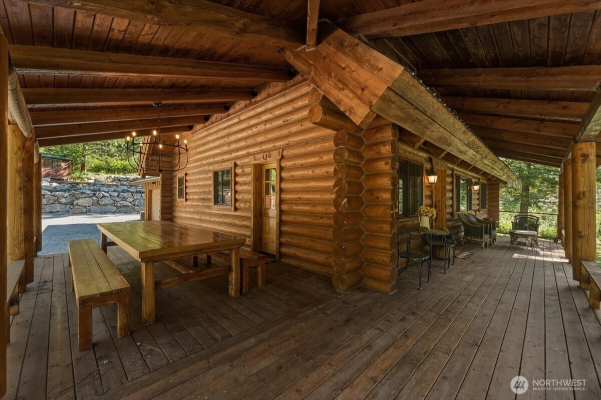 2250 First Crk Road Chelan, WA 98816 - Photo 15 of 39 a view of a porch with furniture and wooden floor