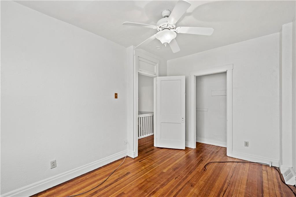 2927 Willett Road Pittsburgh, PA 15227 - Photo 18 of 24 a view of an empty room with wooden floor