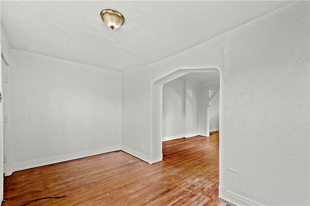 2927 Willett Road Pittsburgh, PA 15227 - Photo 4 of 24 a view of a livingroom with wooden floor
