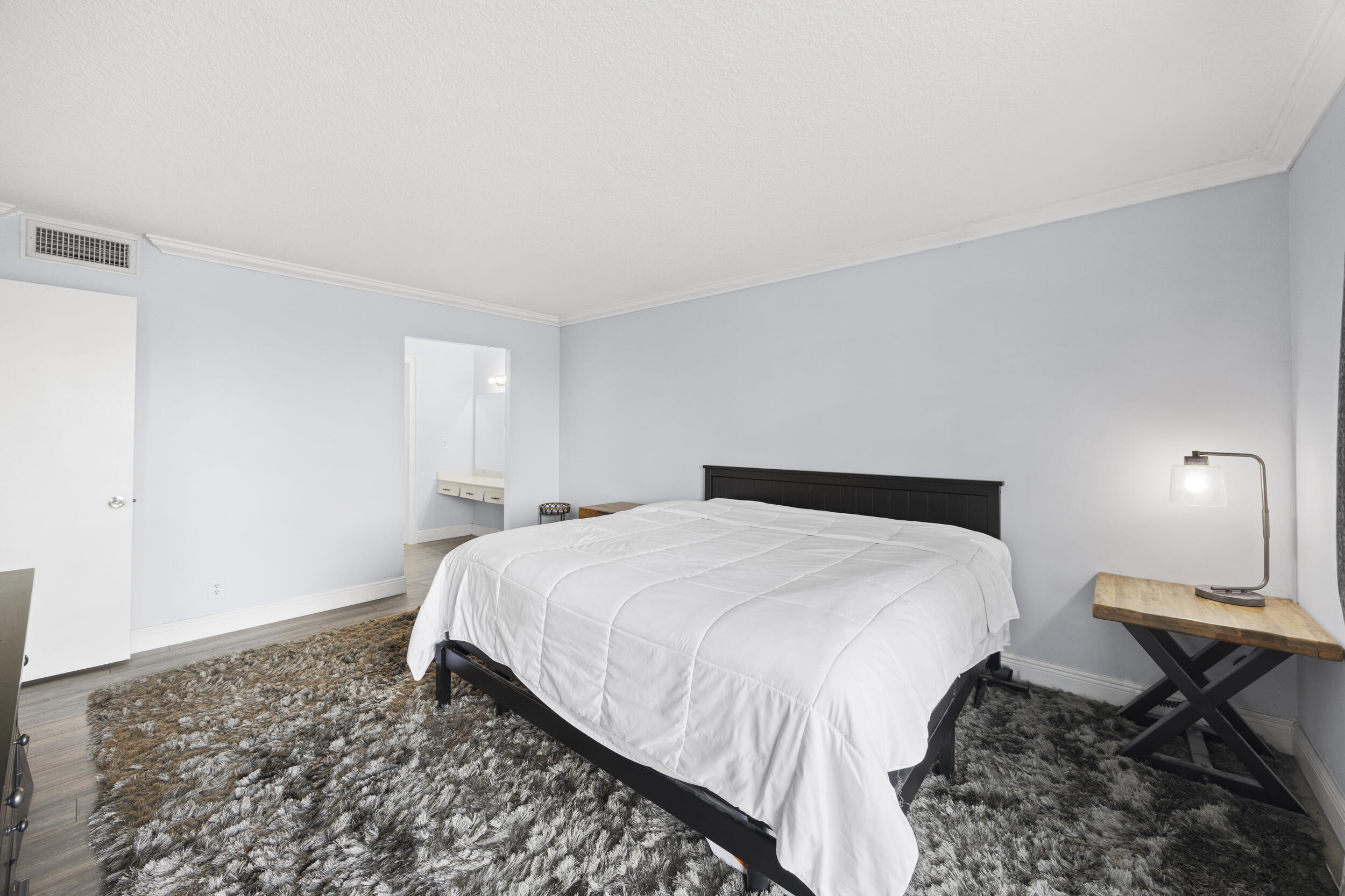 5301 Northwest 2nd Avenue, Unit 1010 Boca Raton, FL 33487 - Photo 17 of 35 Primary Bedroom