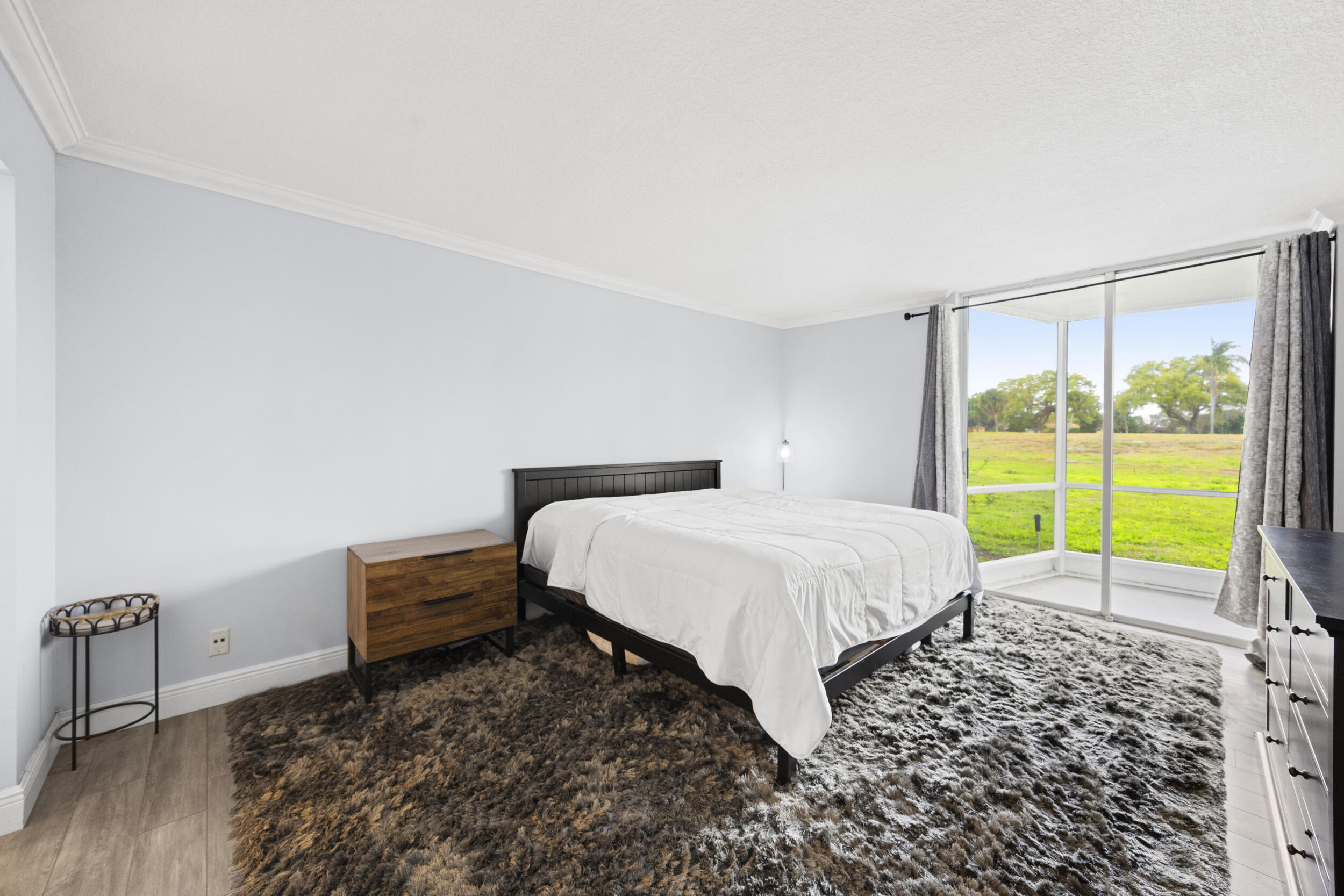 5301 Northwest 2nd Avenue, Unit 1010 Boca Raton, FL 33487 - Photo 18 of 35 Primary Bedroom