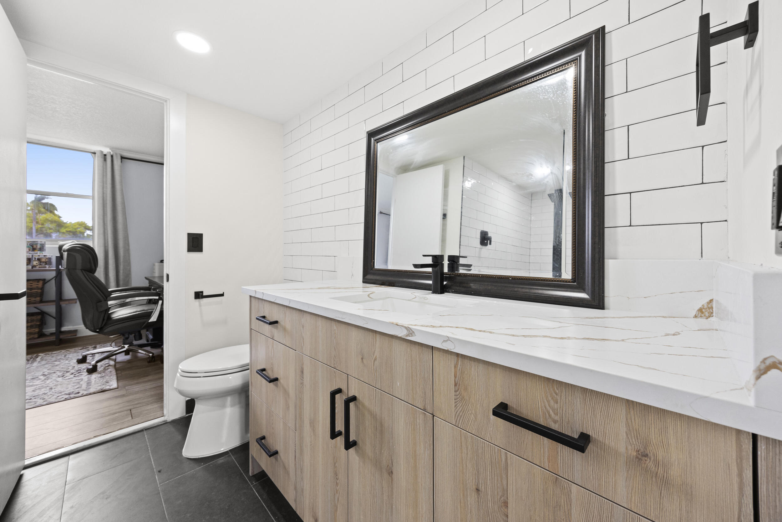 5301 Northwest 2nd Avenue, Unit 1010 Boca Raton, FL 33487 - Photo 27 of 35 Guest Bathroom