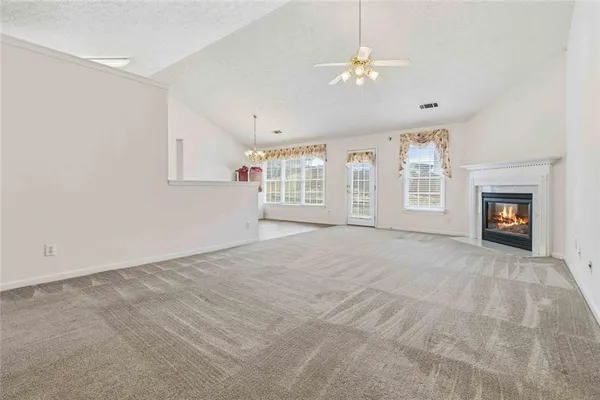 a view of a door and brick walls