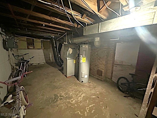 1209 Rice Avenue Lima, OH 45805 - Photo 9 of 14 Unfinished below grade area featuring water heater
