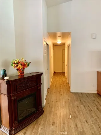 a hallway with wooden floor