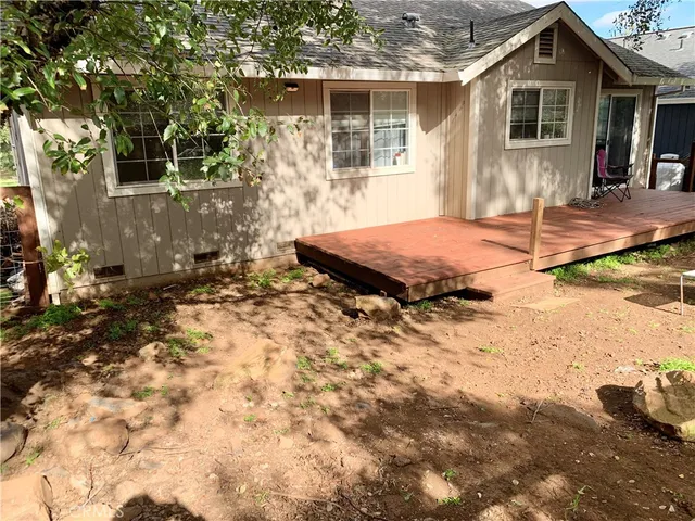 a house with trees in front of it