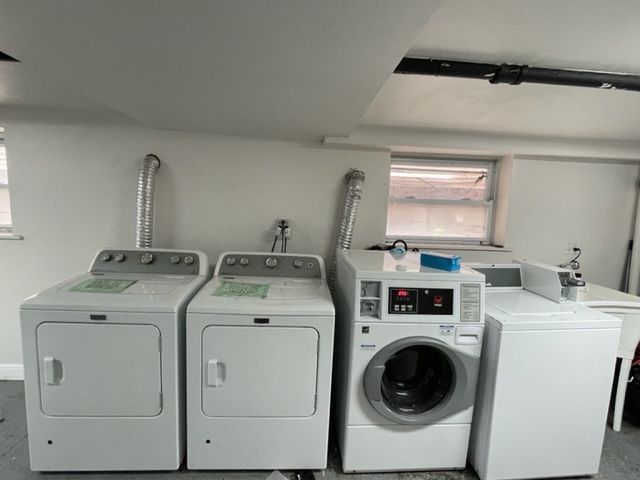 5521 West Farragut Avenue, Unit 3E Chicago, IL 60630 - Photo 11 of 12 a utility room with dryer and washer