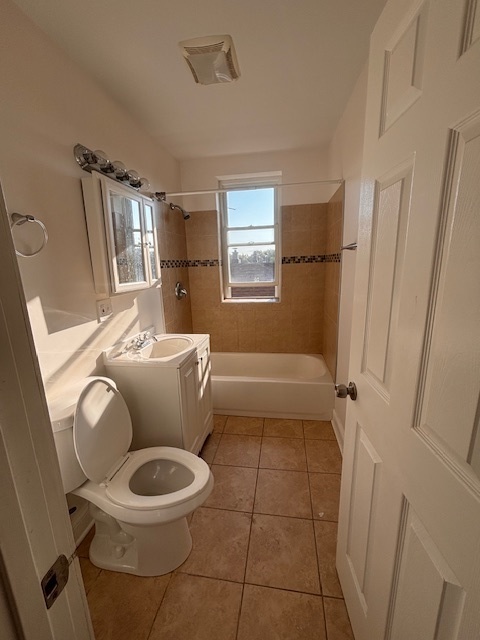 5521 West Farragut Avenue, Unit 3E Chicago, IL 60630 - Photo 5 of 12 a bathroom with a toilet and a shower