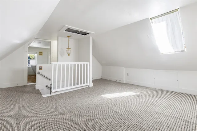 a bedroom with a bed and a cabinets