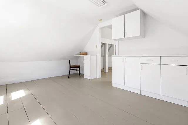 a view of a backyard with sitting area