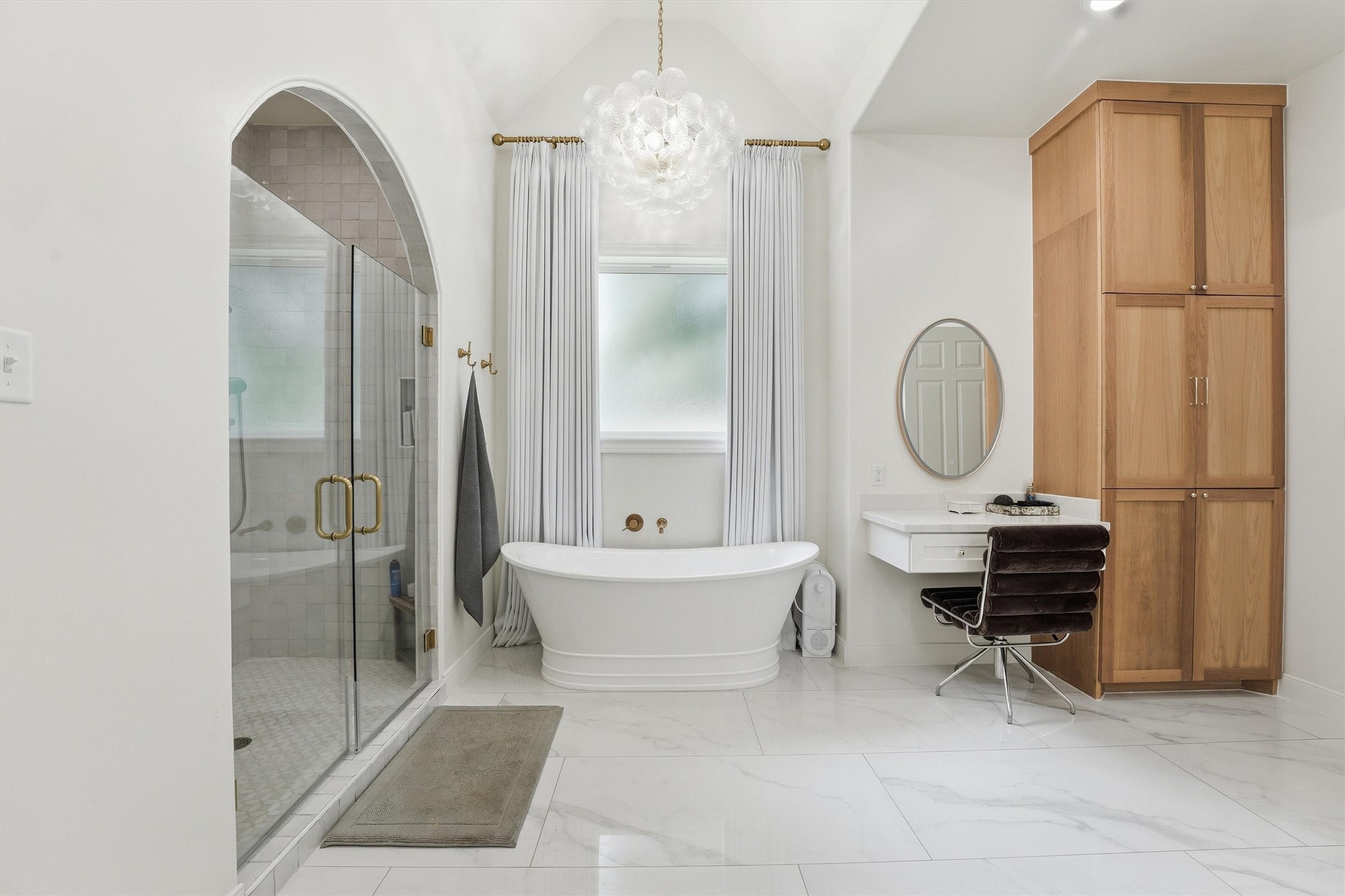 23210 Willowcreek Stables Road Spring, TX 77389 - Photo 14 of 45 Spa-inspired primary en suite w/ freestanding tub, walk-in shower, designer lighting & custom cabinetry.