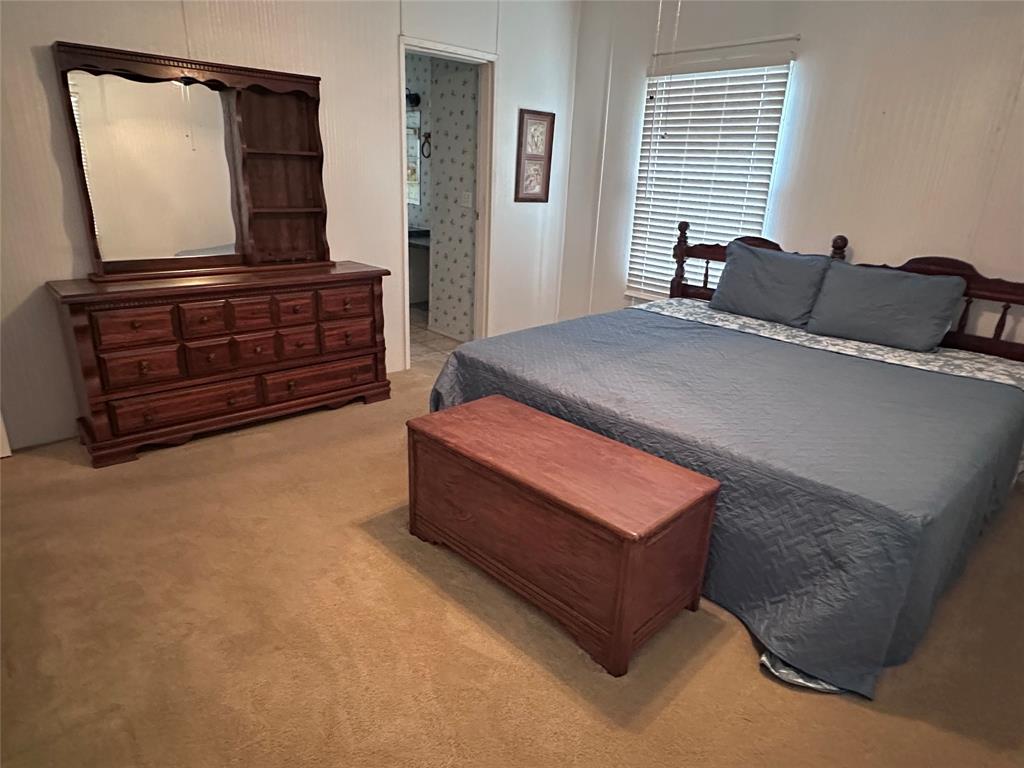 307 West Division Street Graford, TX 76449 - Photo 4 of 22 a living room with furniture and a flat screen tv